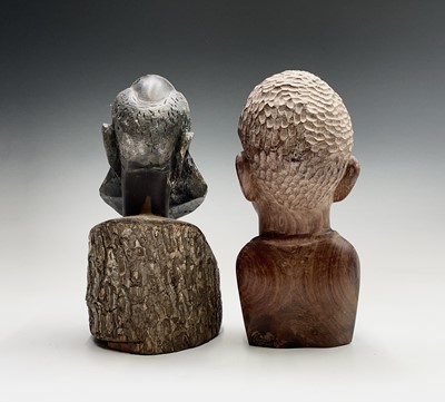 Lot 208 - An African carved wood head and shoulders bust...