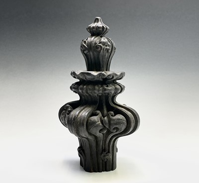Lot 211 - An elaborately carved wooden finial. Height 30cm.