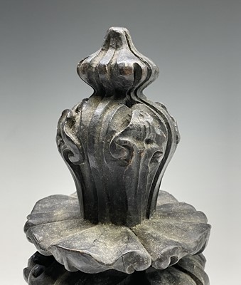 Lot 211 - An elaborately carved wooden finial. Height 30cm.