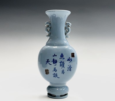 Lot 201 - A Chinese blue glazed porcelain wall pocket,...