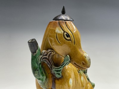 Lot 32 - A Chinese sancai-glazed teapot in the form of...