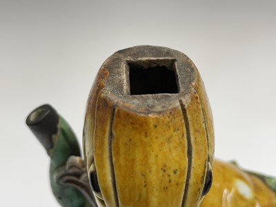 Lot 32 - A Chinese sancai-glazed teapot in the form of...