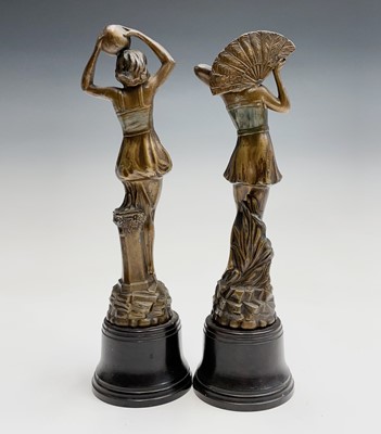 Lot 204 - A pair of Art Deco spelter female figures,...