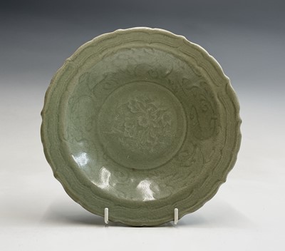 Lot 198 - A Chinese celadon dish, Ming Dynasty, height 4....