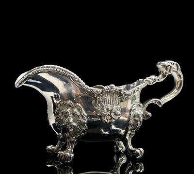 Lot 131 - A magnificent George III cast silver sauce...
