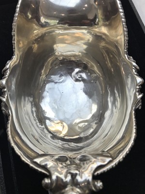 Lot 131 - A magnificent George III cast silver sauce...