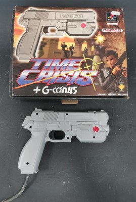 Lot 29 - A Playstation 1 Time Crisis gun controller,...