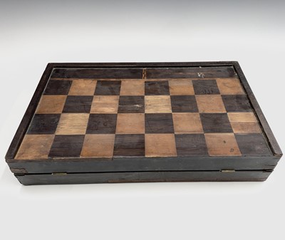 Lot 1038 - An Anglo-Indian inlaid hardwood games box,...