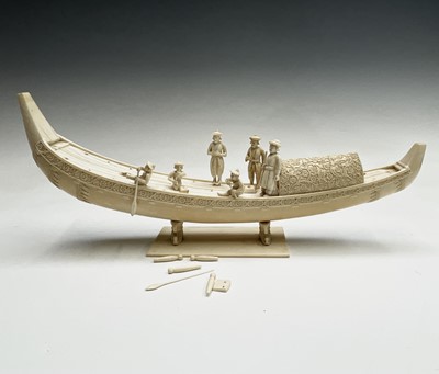 Lot 230 - A Chinese carved ivory model of a river boat,...