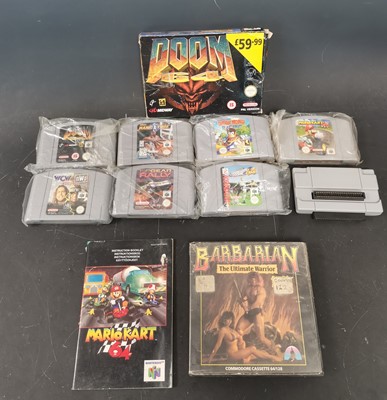 Lot 38 - Six Nintendo 64 games including Doom with box,...