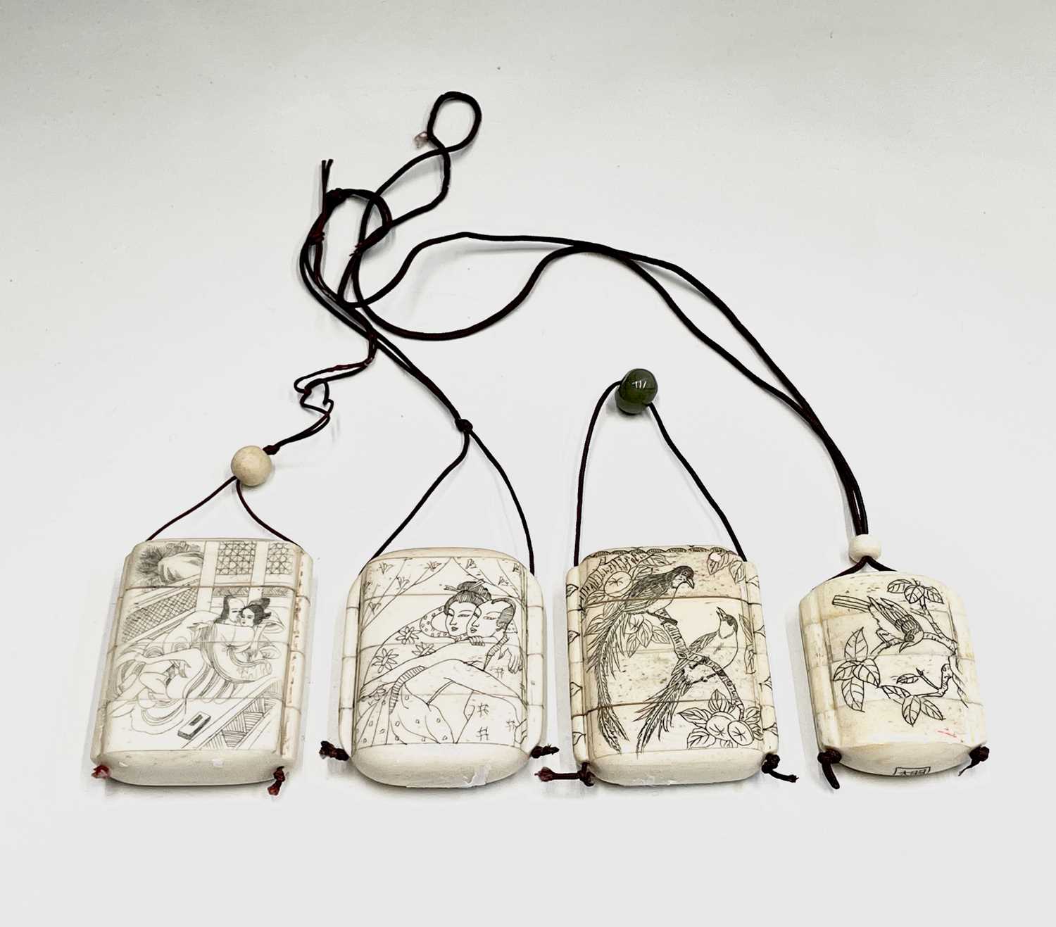 Lot 247 - A group of four bone inro, each engraved