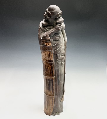 Lot 237 - A Chinese carved bamboo figure of Liu Hai,...