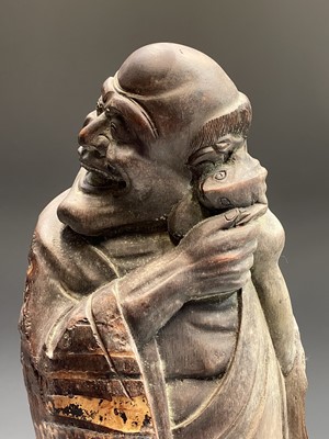 Lot 237 - A Chinese carved bamboo figure of Liu Hai,...