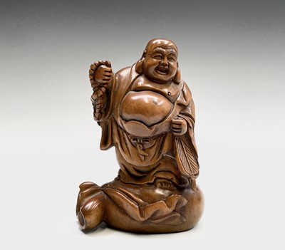 Lot 269 - A Chinese carved boxwood figure of Buddha,...