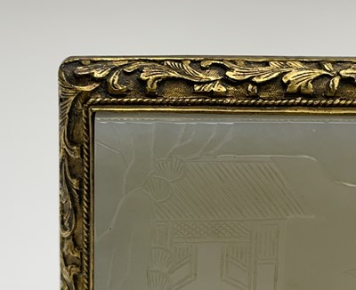 Lot 36 - A Chinese carved jade panel, Qing Dynasty,...
