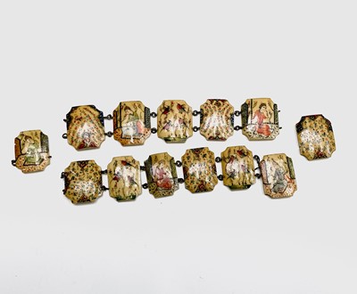 Lot 1046 - A Persian painted bone bracelet.