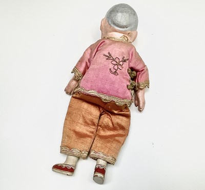 Lot 263 - Three Chinese dolls, in traditional costume,...