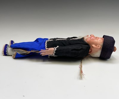Lot 263 - Three Chinese dolls, in traditional costume,...