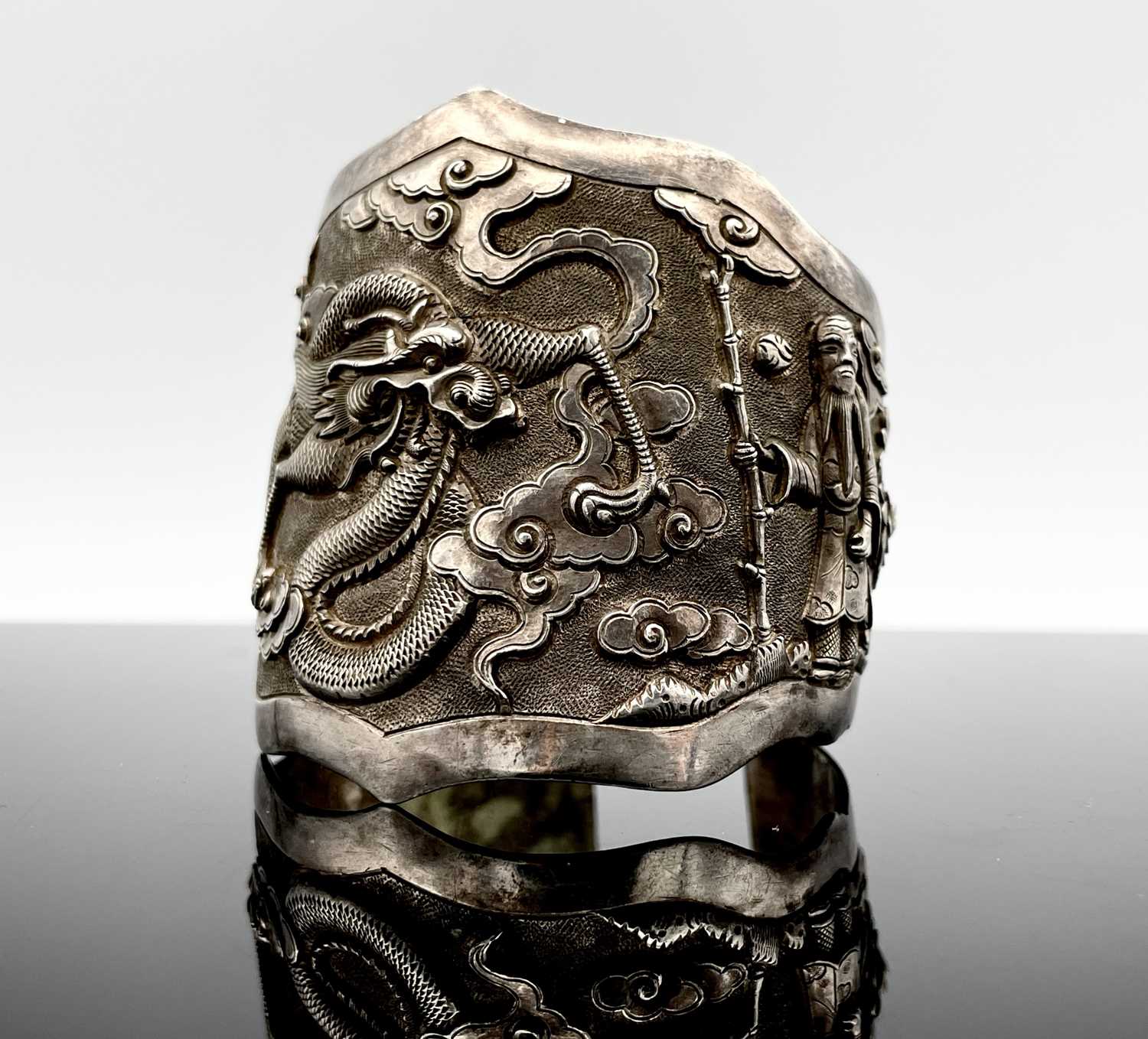 Lot 215 - A Chinese silver cuff bracelet. Impressed mark...