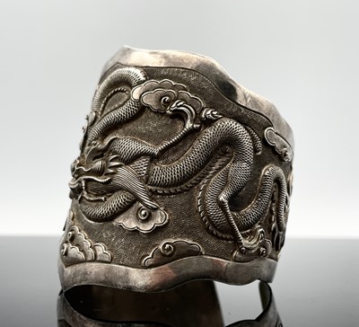 Lot 215 - A Chinese silver cuff bracelet. Impressed mark...