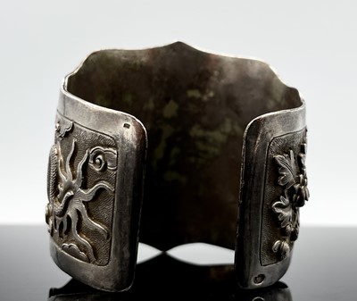 Lot 215 - A Chinese silver cuff bracelet. Impressed mark...