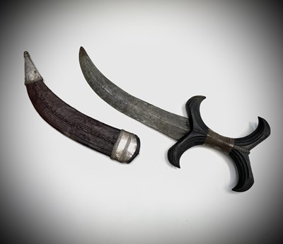 Lot 216 - A Hadendoa hook knife from Sudan, with fluted...