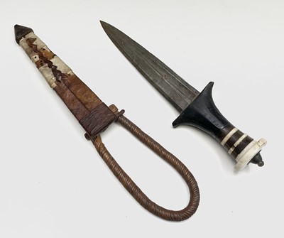 Lot 216 - A Hadendoa hook knife from Sudan, with fluted...