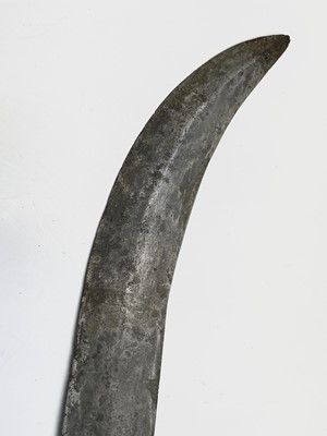 Lot 216 - A Hadendoa hook knife from Sudan, with fluted...