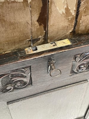 Lot 17 - A George III oak mule chest, the hinged plain...