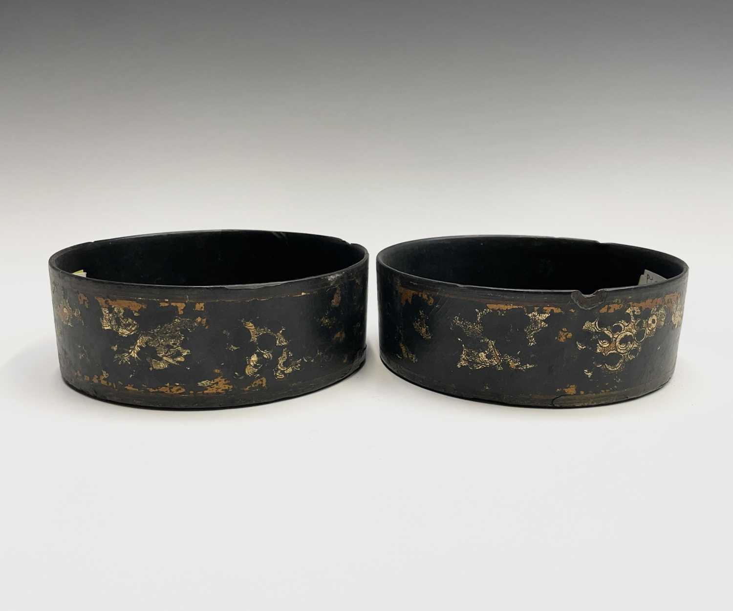 Lot 222 - A pair of Regency black lacquered circular...