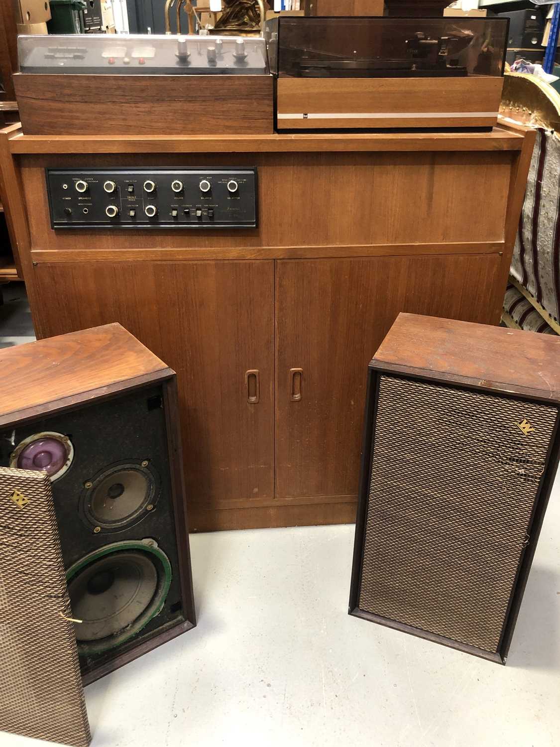 Lot 9 - A teak mid-century stereo cabinet with...