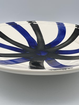 Lot 278 - A ceramic bowl painted with an abstract design...