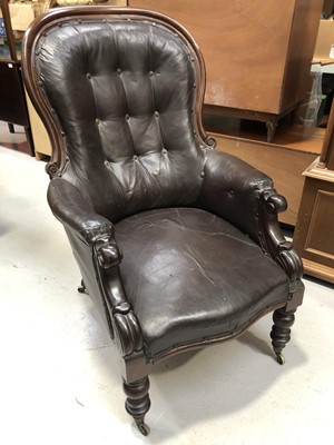 Lot 17 - A Victorian mahogany faux leather armchair on...