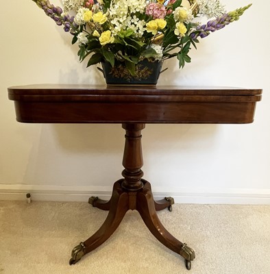 Lot 3138 - A William IV mahogany fold top card table, on...