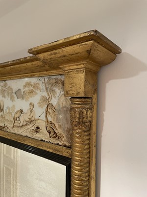 Lot 3139 - A Regency gilt mirror, the verre eglomise...