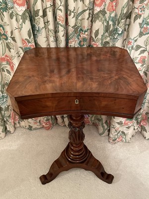 Lot 3150 - A George IV mahogany work table, with concave...