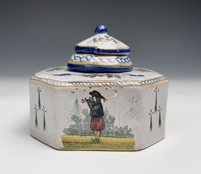 Lot 1018 - A French tin-glazed inkwell and cover with...