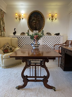 Lot 3165 - A Regency mahogany sofa table, fitted with two...