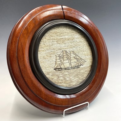 Lot 359 - A sailors woolwork circular panel of a three...