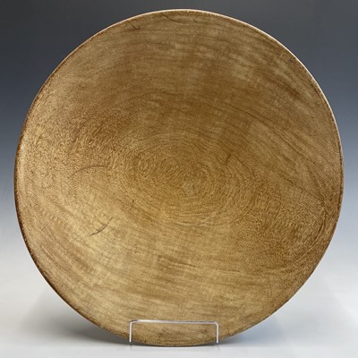Lot 334 - A large turned wood bowl, diameter 54cm.