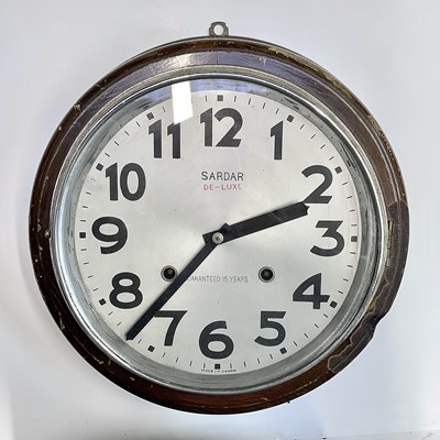 Lot 2923 - A modern Japanese two train dial clock, the 9...