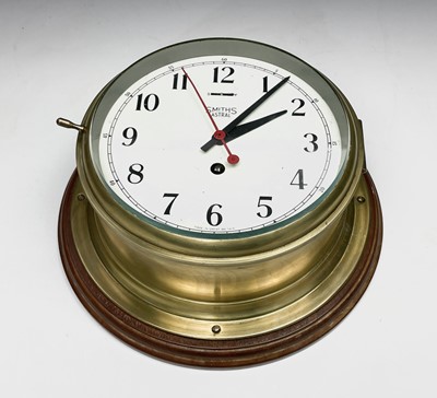 Lot 2921 - A brass cased ships bulkhead wall clock, the 7....