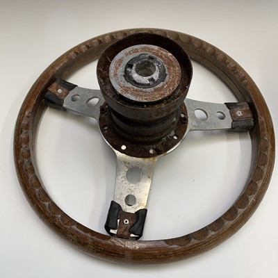 Lot 607 - A Mountney steering wheel, ash laminated,...