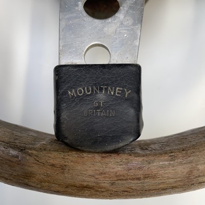 Lot 607 - A Mountney steering wheel, ash laminated,...