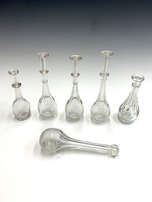 Lot 971 - Six assorted George III glass toddy lifters,...