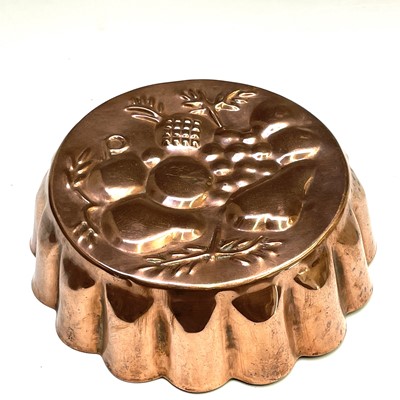 Lot 188 - A Victorian copper jelly mould, height 11.5cm,...