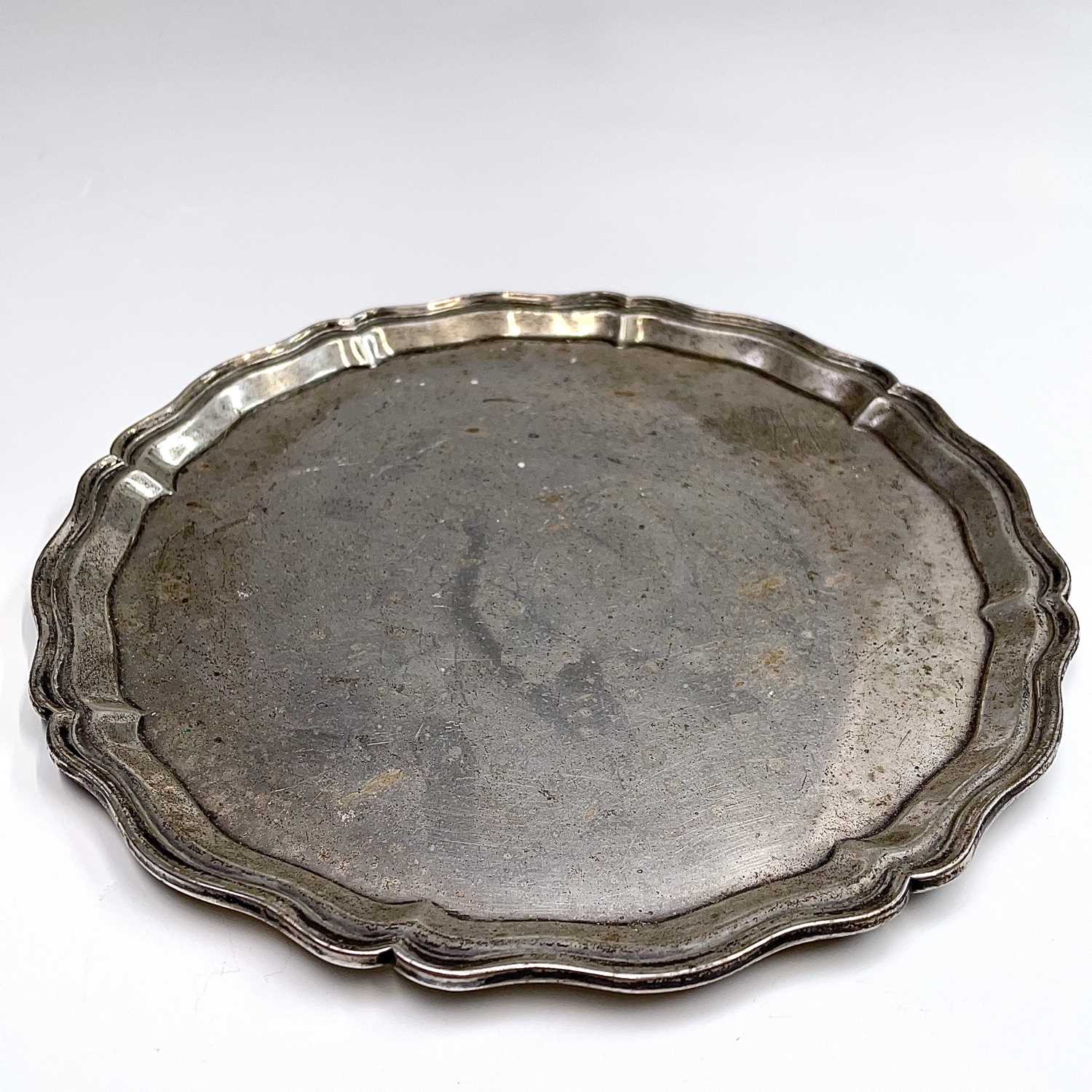 Lot 62 - A plain silver tray with shaped rim by Mappin...
