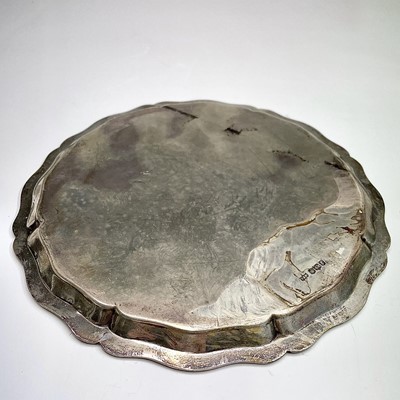 Lot 62 - A plain silver tray with shaped rim by Mappin...