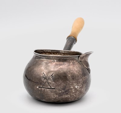 Lot 46 - A Georgian provincial silver brandy pan with...
