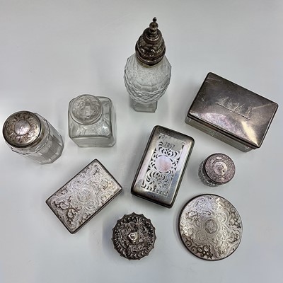 Lot 44 - Glass jars and silver lids